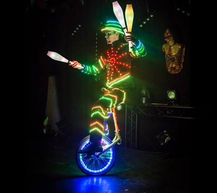 Jongleur monocycle lumineux